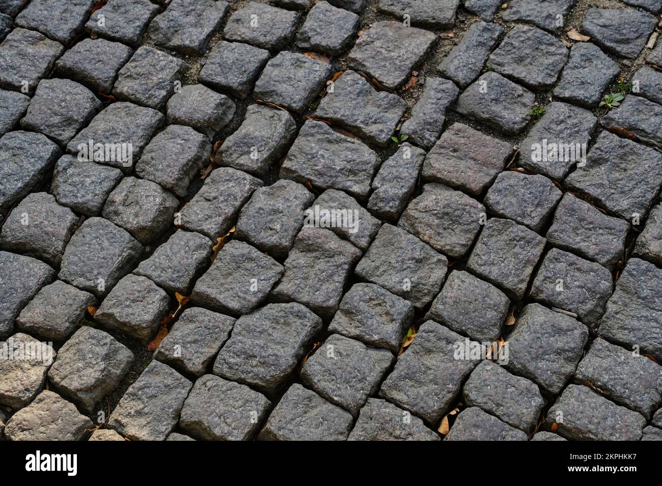 Vecchie pietre di pavimentazione della pietra, superficie di strada Foto Stock