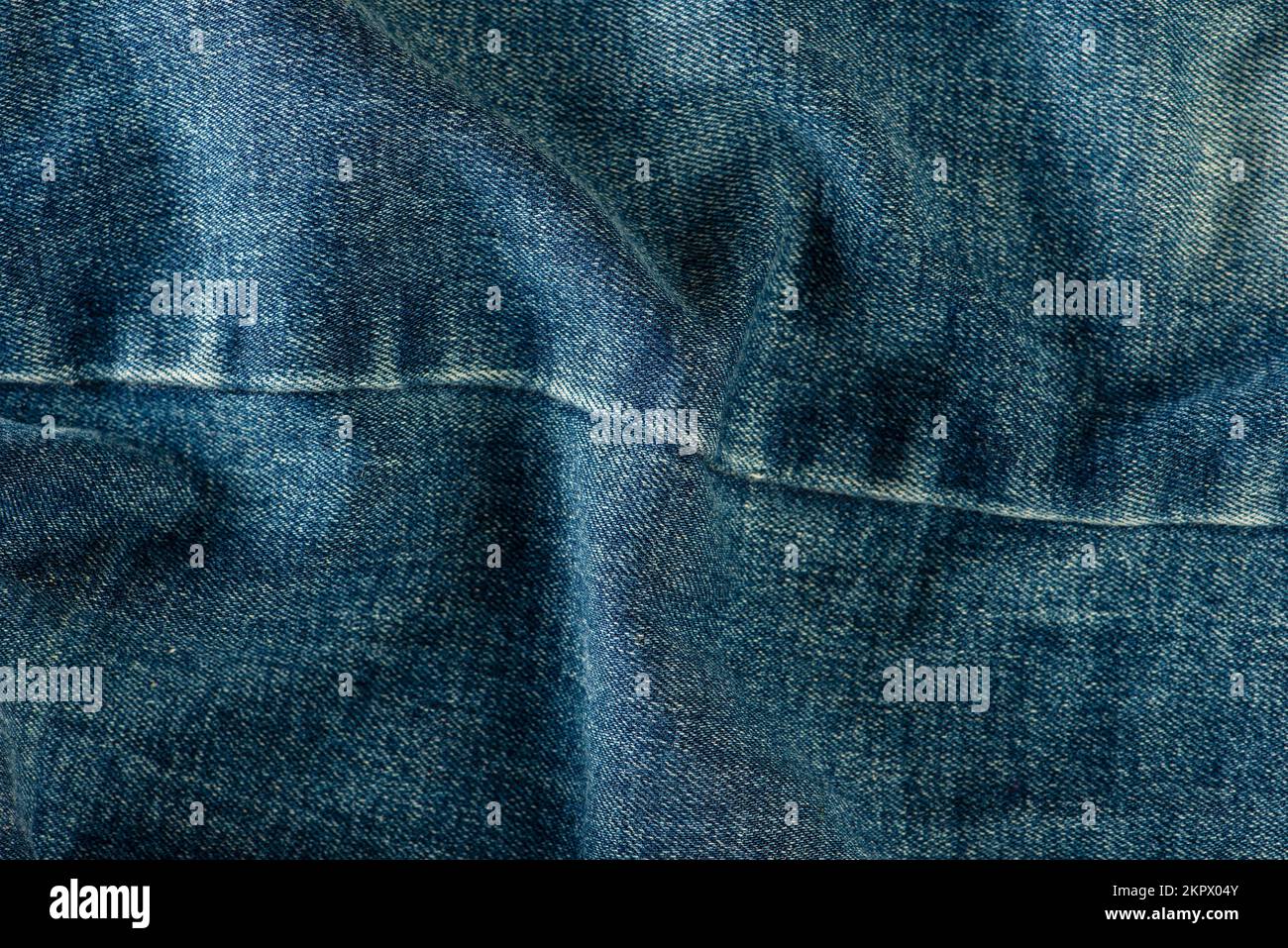 Texture di denim primo piano. Cuciture in jeans con spazio per il testo Foto Stock