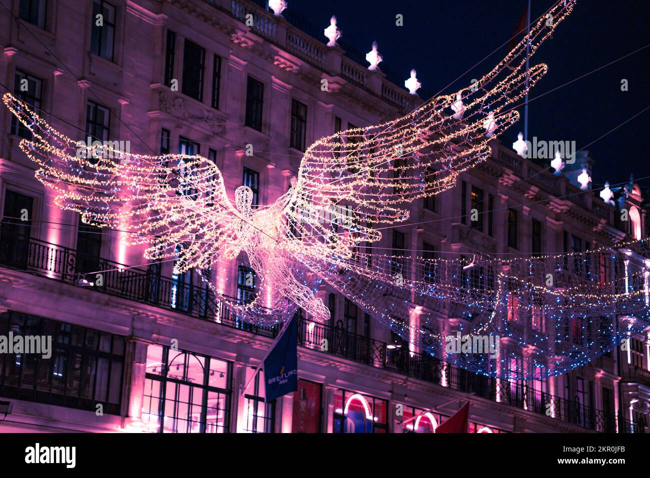 Luci natalizie a Londra con folle Foto Stock