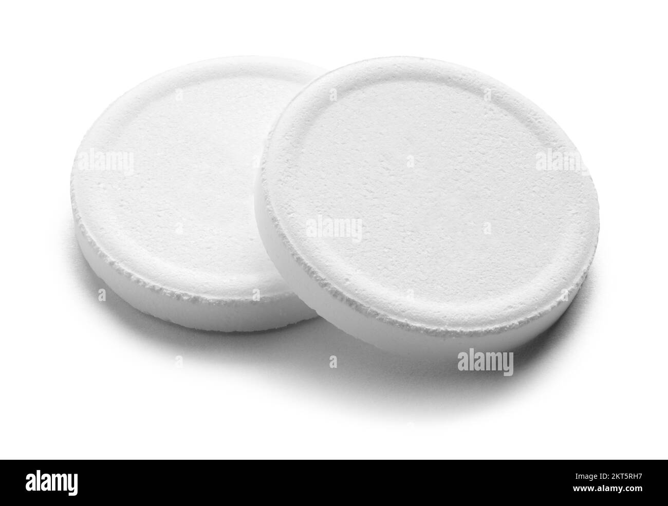 Due grandi pillole rotonde ritagliate su bianco. Foto Stock