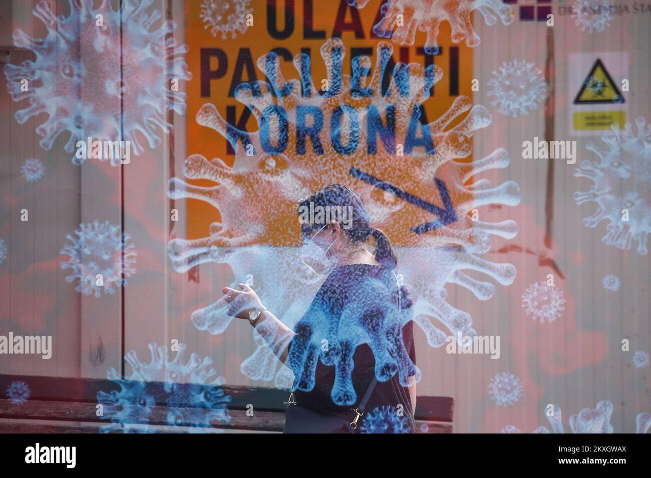 LLUSTRATION - PRESA CON DOPPIA ESPOSIZIONE. Nell'Istituto di insegnamento per la salute pubblica 'Dr. Andrija Stampar', i dipendenti stanno testando i cittadini. Diagnostica del coronavirus drive-in per velocizzare la diagnosi e aumentare il numero di persone testate. Le persone non escono dall'auto durante questo test, il che aumenta il livello di sicurezza della persona sottoposta a test e dell'operatore sanitario. Il virus che causa COVID-19 è nella maggior parte dei casi trasmesso attraverso goccioline che si formano quando una persona infetta tosse, starnuti o esalazioni. Queste goccioline sono troppo pesanti per volare attraverso l'aria e cadere rapidamente al Foto Stock