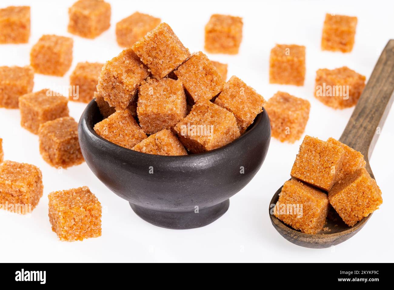 Cristalli di zucchero di canna marrone cubed non raffinati - Saccharum officinarum Foto Stock