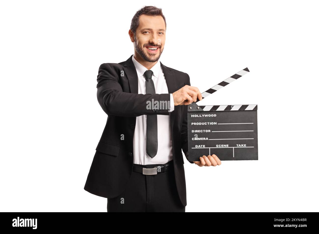 Uomo in tuta e cravatta che tiene un clapperboard film isolato su sfondo bianco Foto Stock