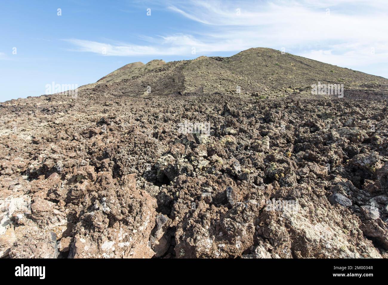 Vulcano Colorado con flusso di lava solidificato, Lanzarote, Isole Canarie, Spagna, Europa Foto Stock