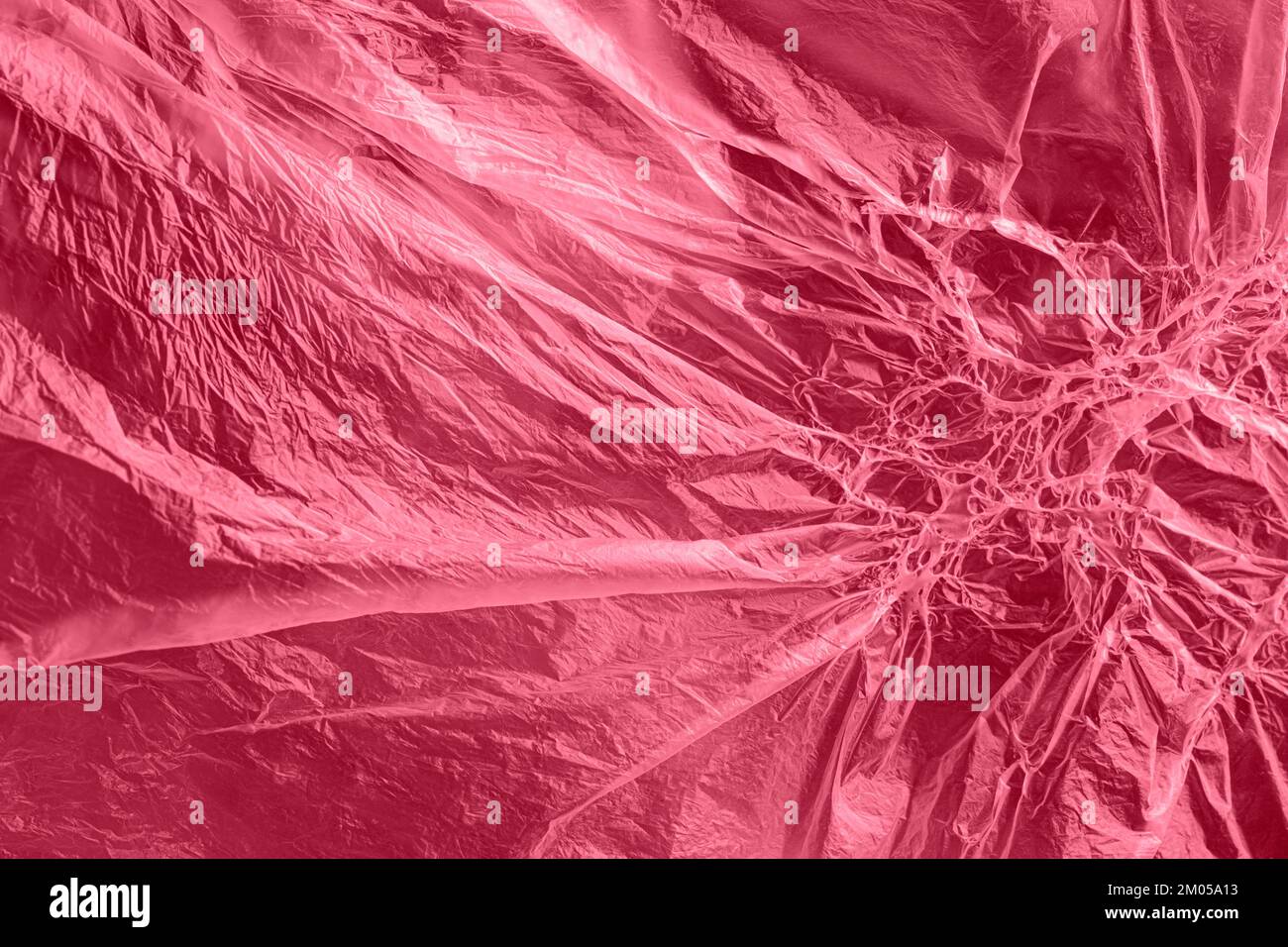Sfondo astratto plastico. Fantastica texture di polietilene fuso, plastica trasparente. Nessun concetto di borsa di plastica, salvare mondo o proteggere concep terra Foto Stock