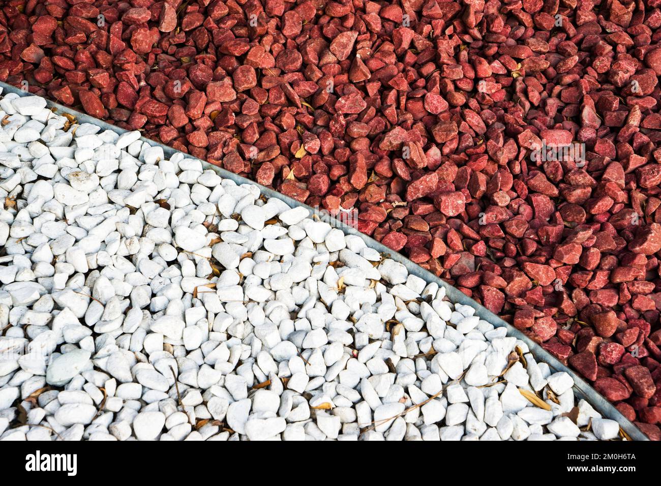 Pietre rosse ghiaia texture macro sfondo, arredamento Foto Stock
