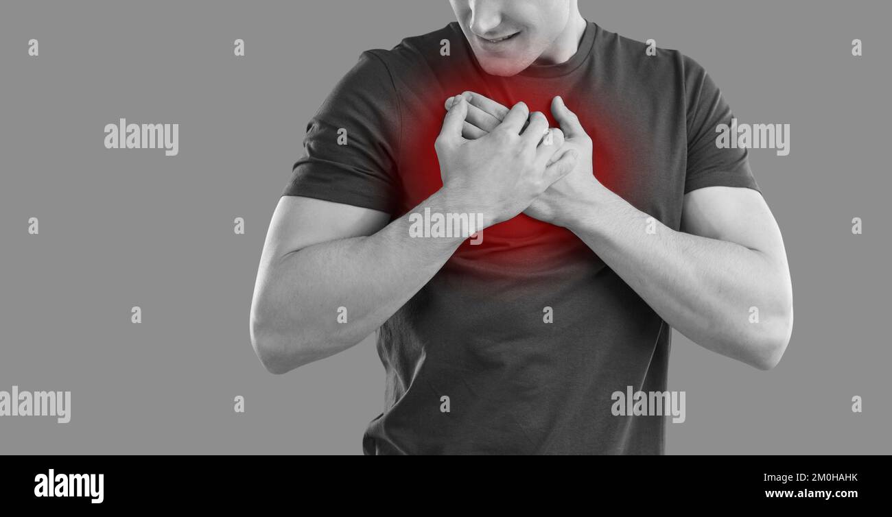 Malessere l'uomo soffre di dolore cardiaco acuto Foto Stock
