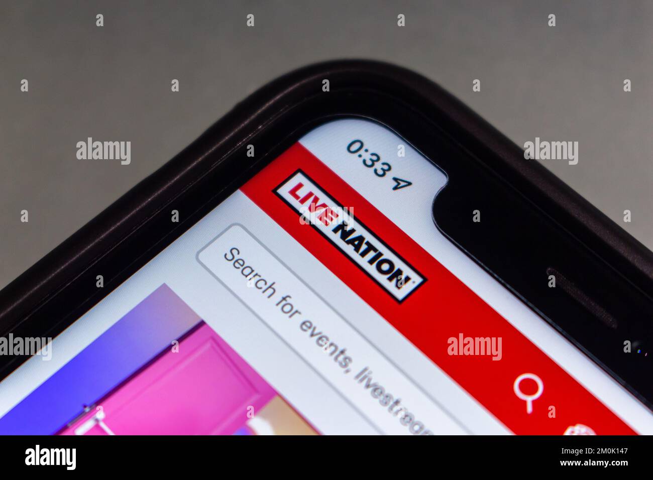 Logo di Live Nation Entertainment, Inc in iPhone. Live Nation è un'azienda statunitense di intrattenimento a livello mondiale dopo la fusione di Live Nation & Ticketmaster Foto Stock