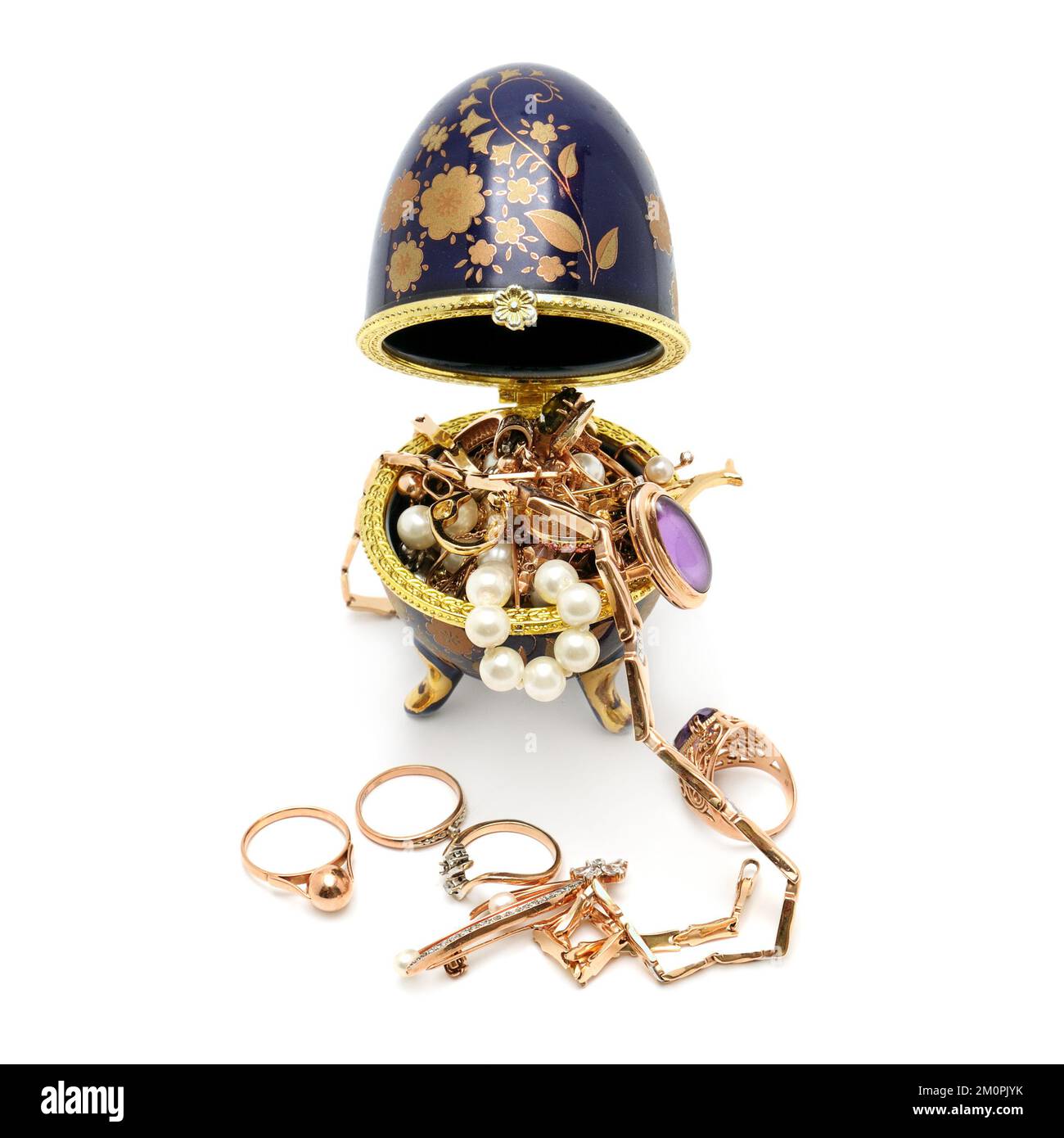 Ornamenti d'oro isolato su uno sfondo bianco Foto Stock