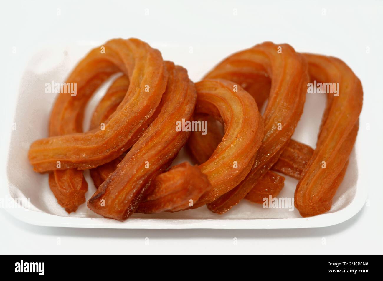 Turco Churros, cibo di strada molto popolare o dessert di strada in Turchia, Halka Tatlisi dessert circolare fritto in olio e zuccherato con sciroppo di miele, s Foto Stock