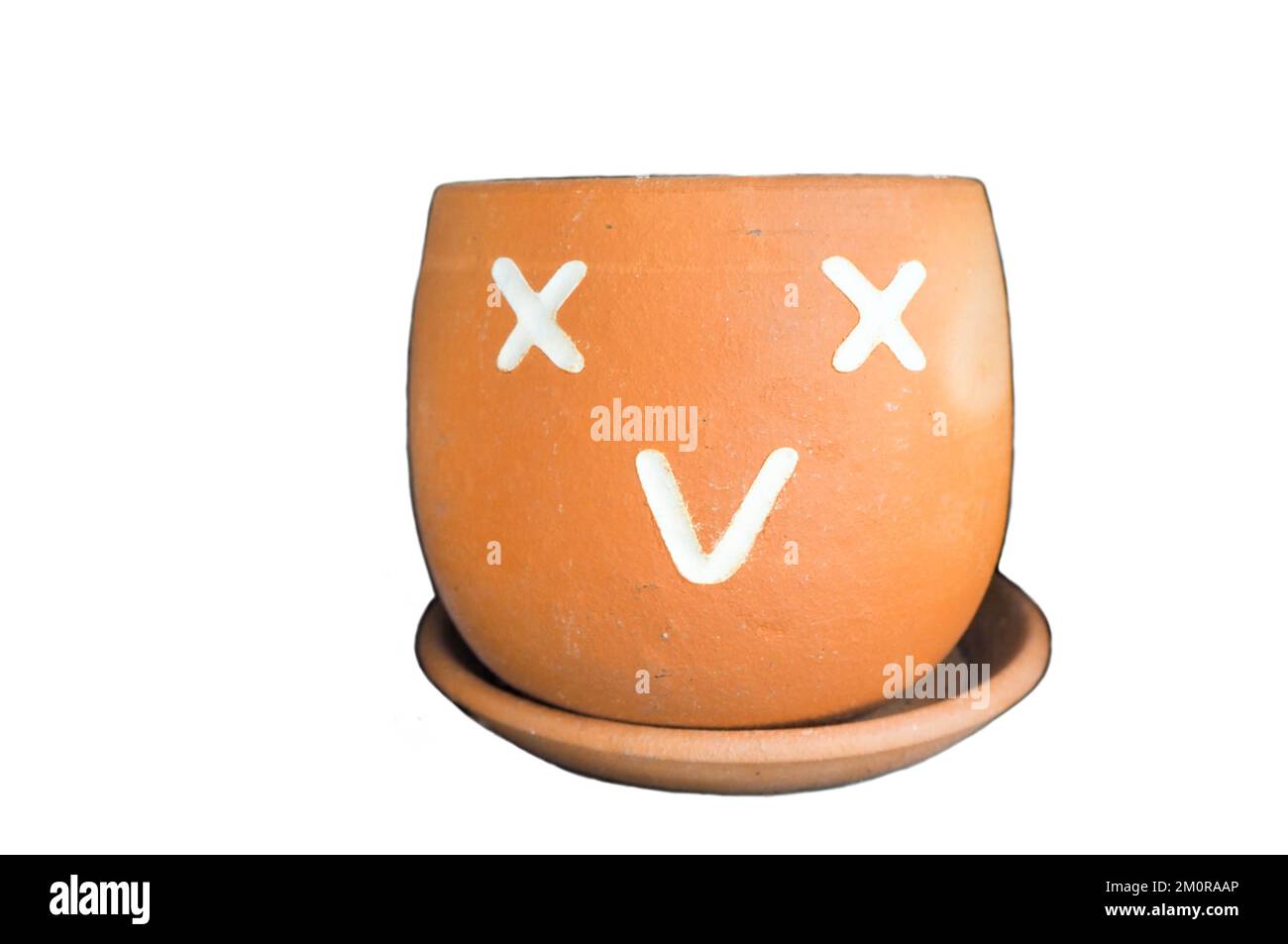 Vaso di fiori con facce che mostrano sentimenti Foto Stock