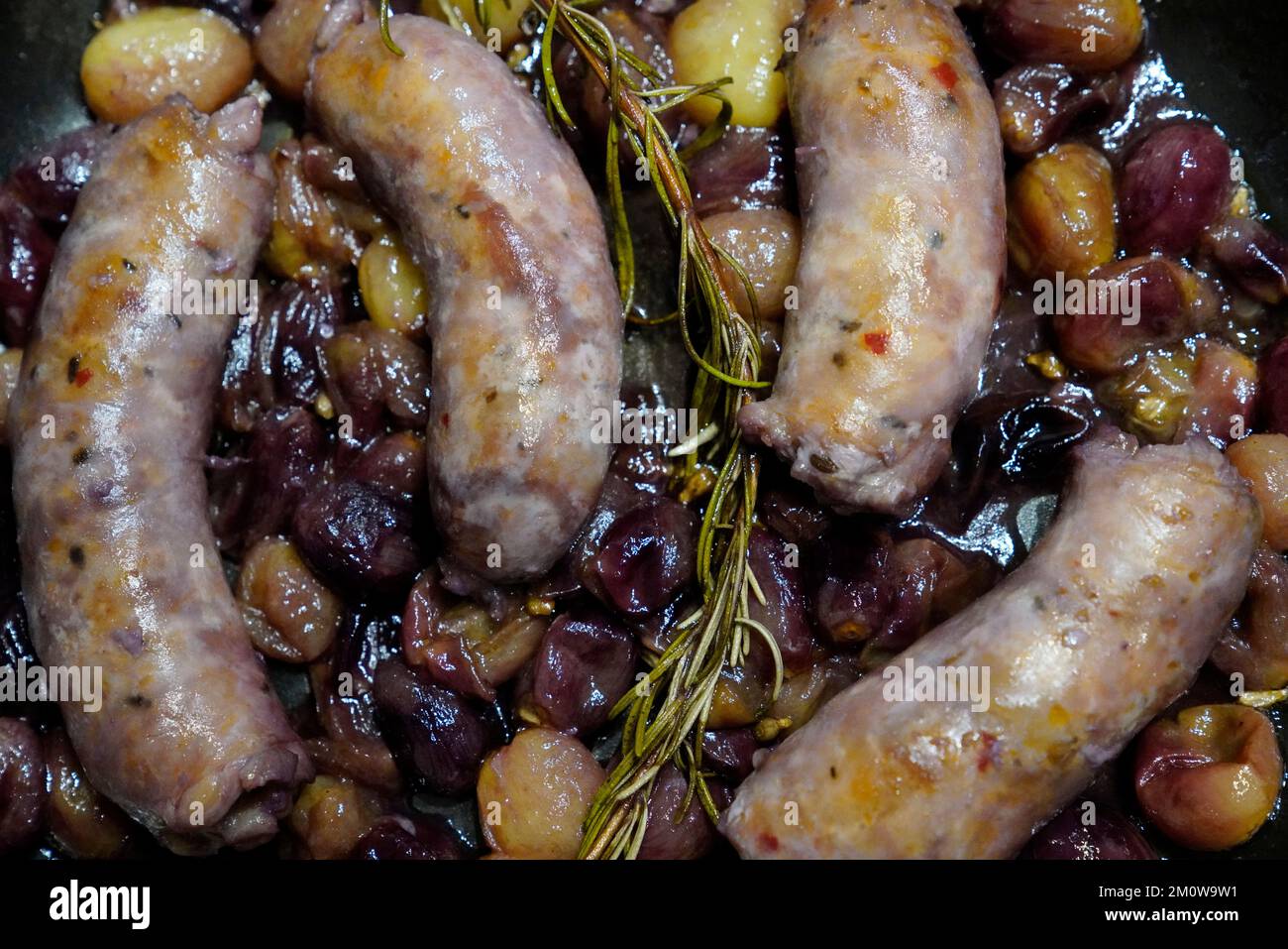 Salsiccia con uva, piatto del sud Italia Foto Stock