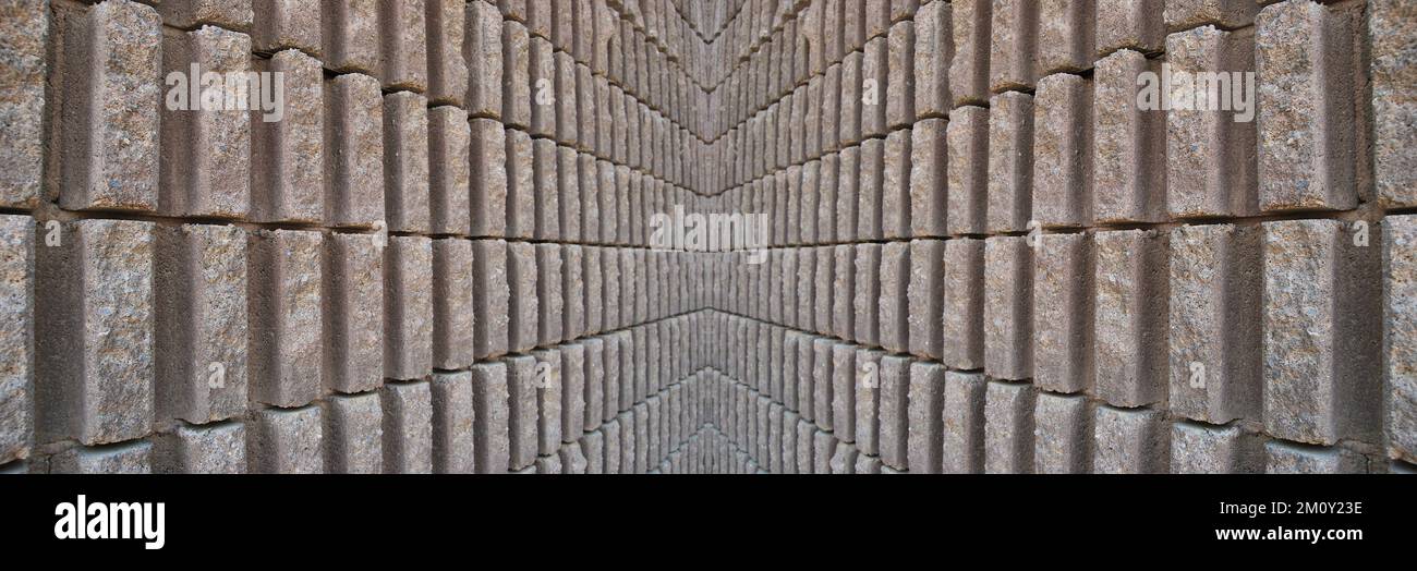 Robusto muro in pietra beige e grigio, adatto per sfondi, senza cuciture Foto Stock