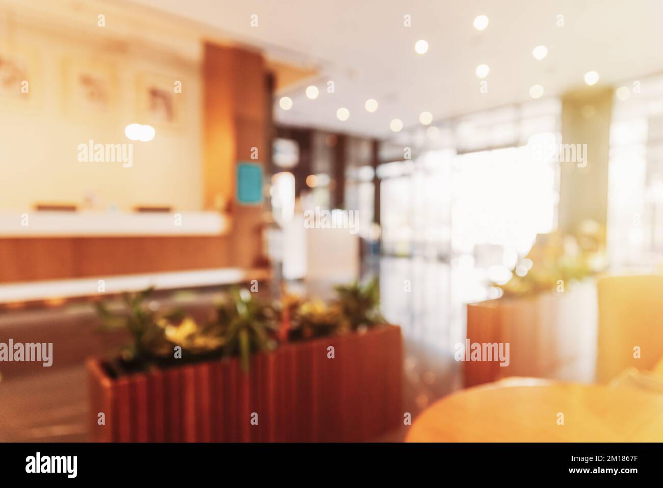 Vista della hall dell'hotel. Sfocatura astratta sfocato boke bokeh sfondo Foto Stock