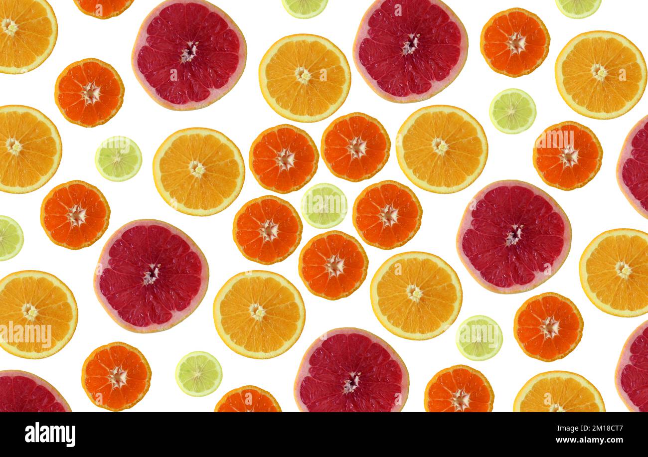 Fondo a fette di agrumi (limone, mandarino, arancia e pompelmo). Idea di concetto di agrume. Sfondo astratto. Foto Stock