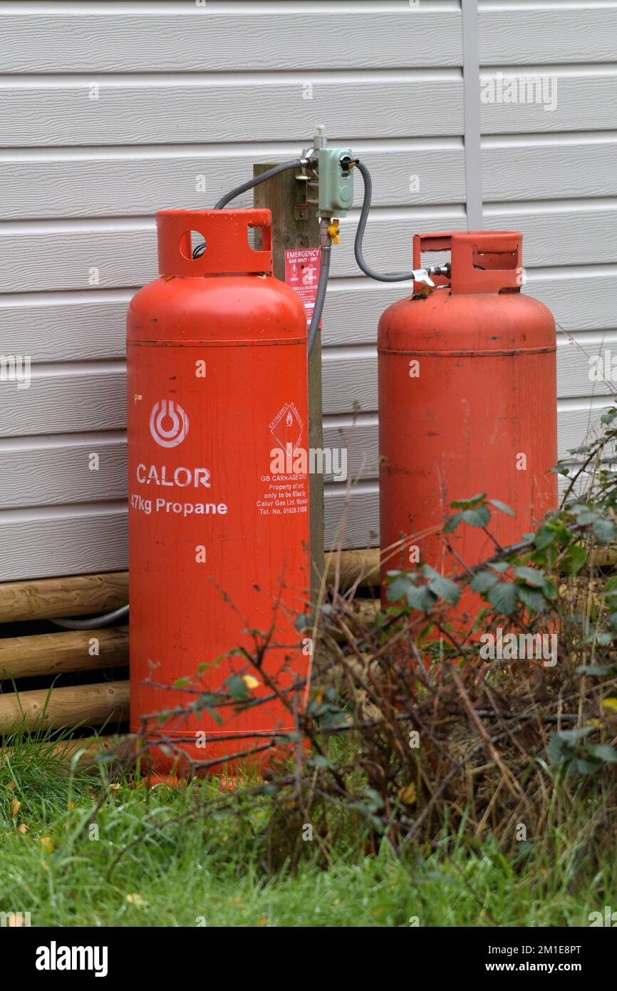 bombole di propano liquido di gas calor al di fuori della caravan statica nord norfolk inghilterra Foto Stock