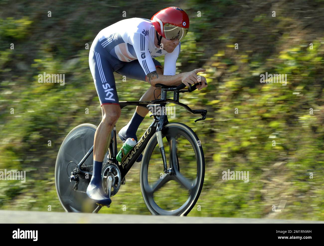 Bradley Wiggins in azione durante la prova a tempo ELITE Men ai Campionati Mondiali di Ciclismo a Firenze, mercoledì 25 settembre 2013. Foto Stock