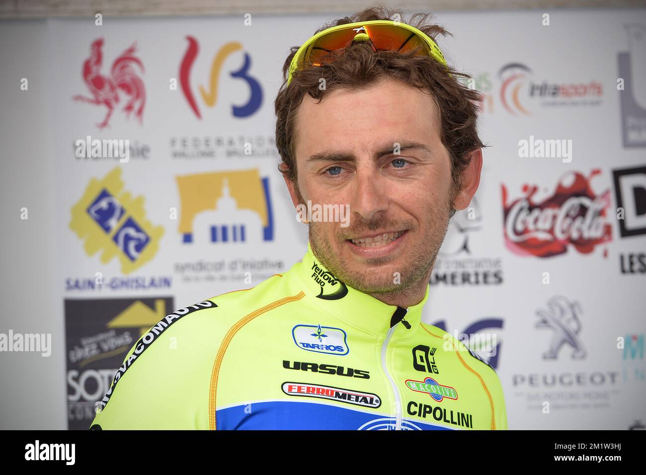 L'italiano Daniele Colli di Neri Sottoli festeggia sul podio dopo la 48th° edizione della gara ciclistica di una giornata 'GP Pino Cerami', a 200 km da Saint-Ghislain a Frameries, sabato 12 aprile 2014. Foto Stock