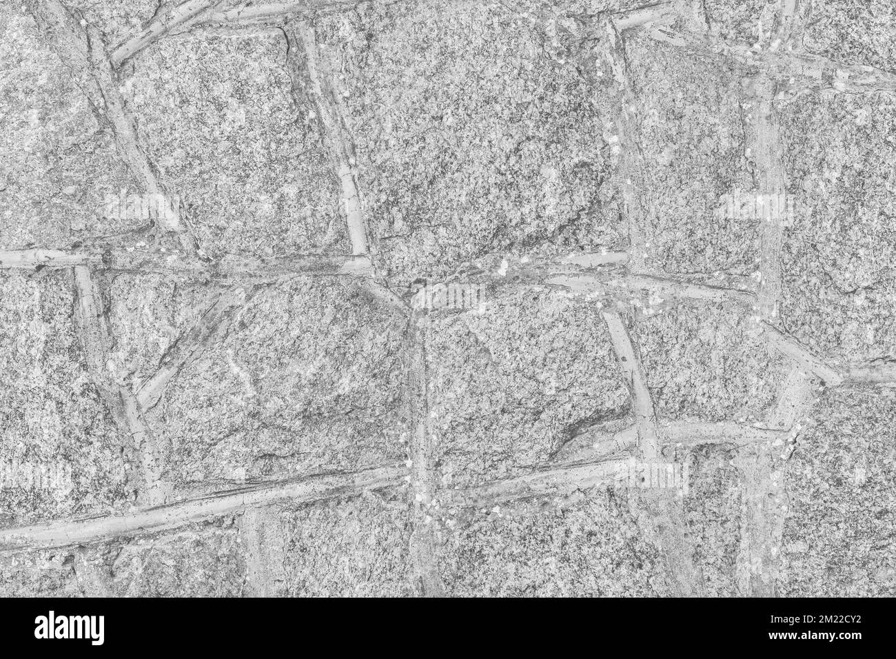 Grigio chiaro grigio pietra acciottolata parete texture rock pattern astratto sfondo. Foto Stock