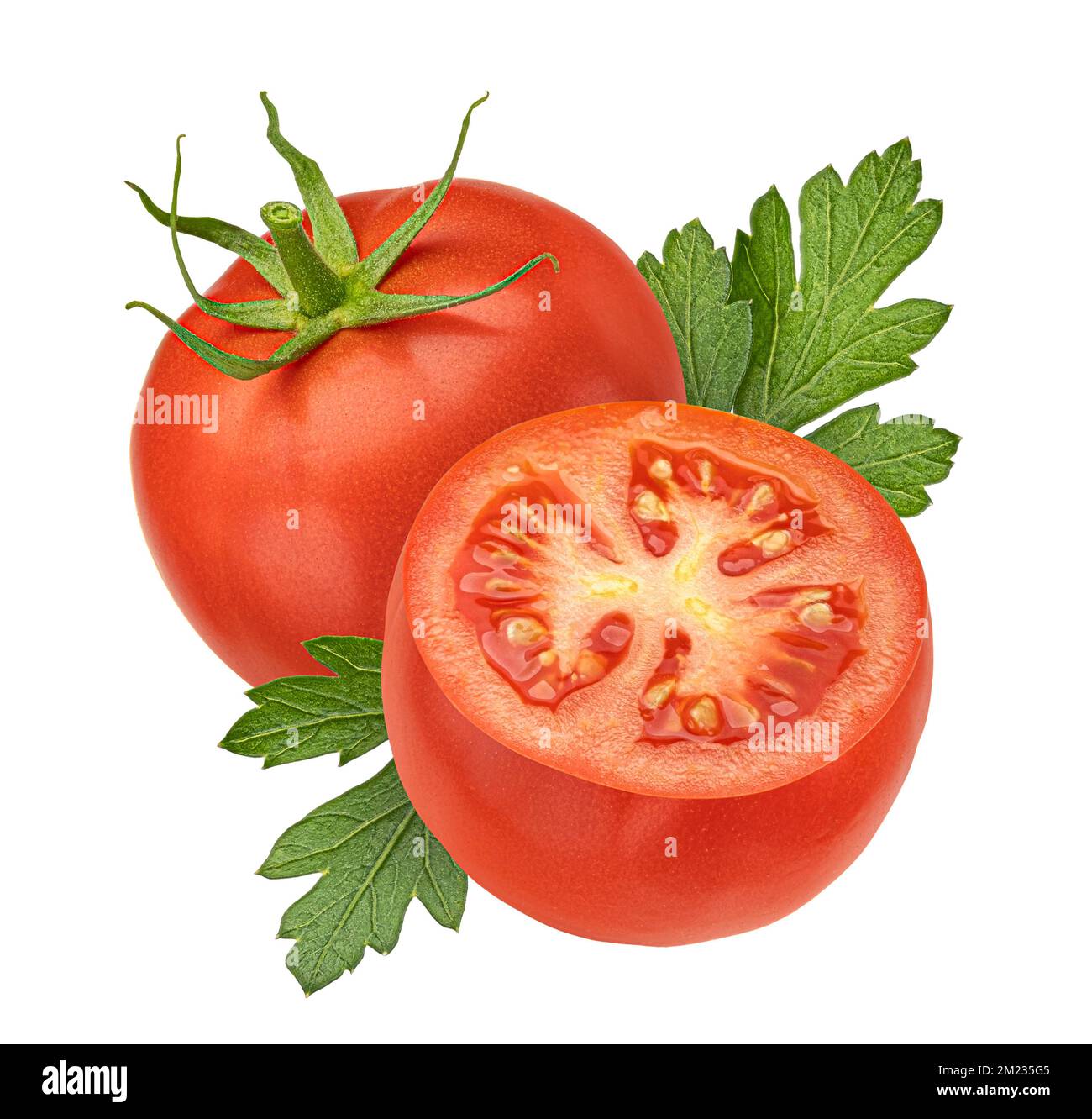 Pomodori ciliegini con foglie di prezzemolo isolati su fondo bianco Foto Stock