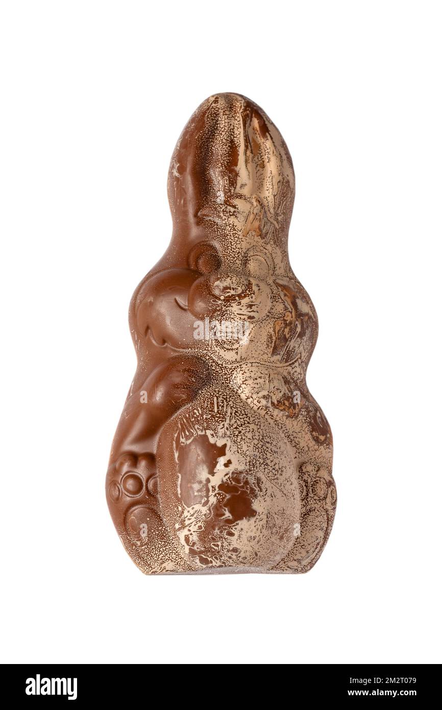 Fiore di cioccolato, rivestimento bianco su vecchio Kinder sorpresa Pasqua coniglietto passato il suo meglio prima data su sfondo bianco - cioccolato fiorito Foto Stock