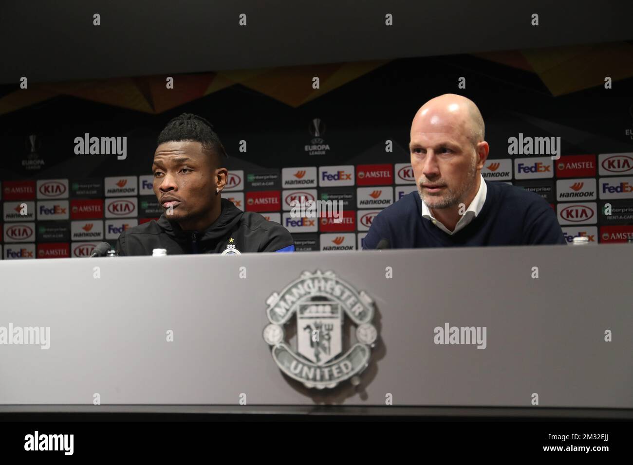 Simon Deli del Club e Philippe Clement, allenatore capo del Club Brugge, hanno illustrato durante una conferenza stampa del Club Brugge in vista del ritorno nelle 1/16 finali della UEFA Europa League tra il Club di calcio belga Brugge e il club inglese Manchester United, a Manchester, in Gran Bretagna, mercoledì 26 febbraio 2020. FOTO DI BELGA BRUNO FAHY Foto Stock