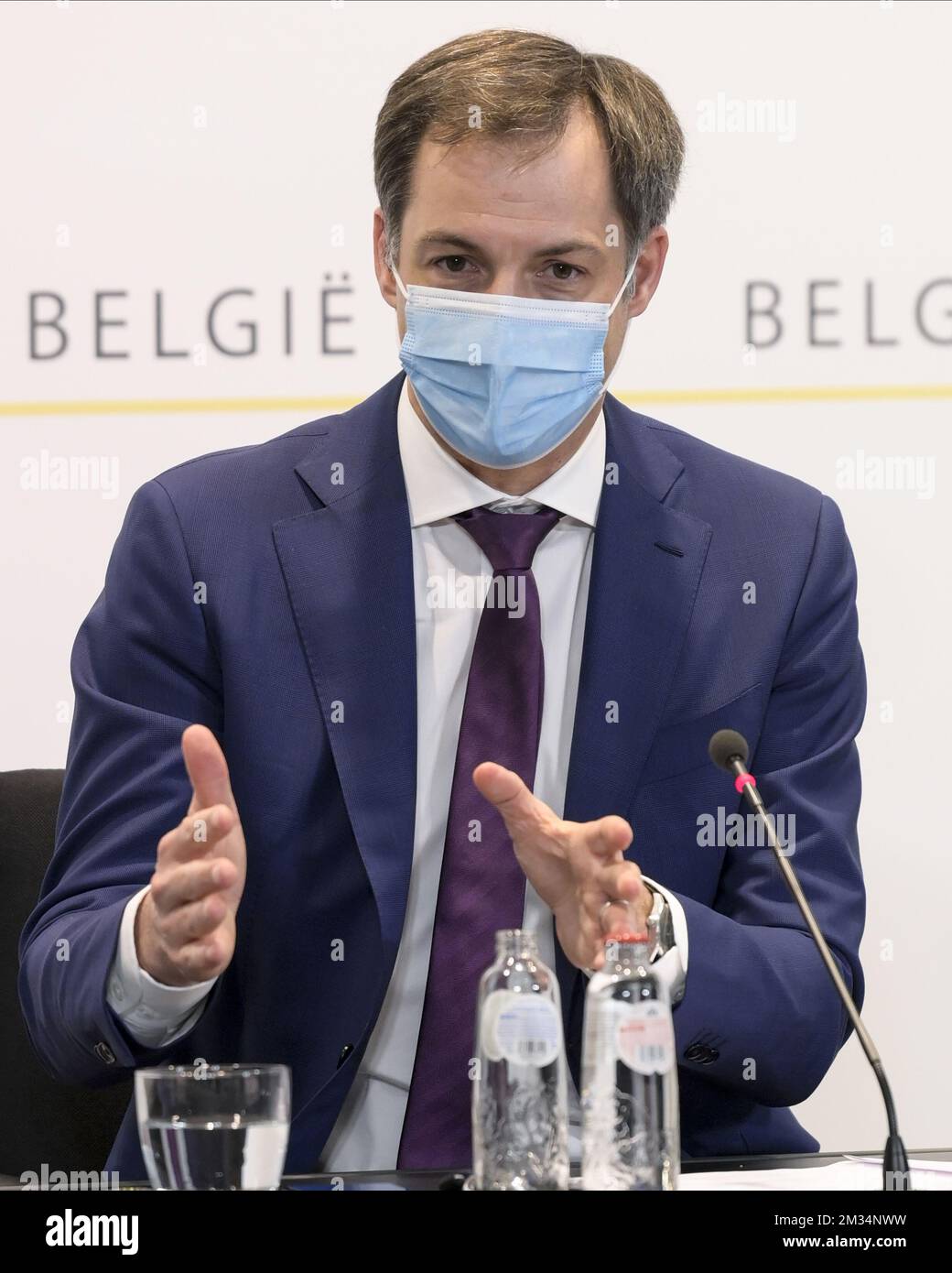 Il primo Ministro Alexander De Croo ha fatto una foto durante una conferenza stampa dopo una riunione del comitato consultivo con i ministri del Governo Federale, dei governi regionali e dei governi comunitari, a Bruxelles, venerdì 19 marzo 2021. Questo incontro con i diversi governi è chiamato quando si discutono questioni che coinvolgono più livelli. Il comitato si riunisce una settimana prima del previsto, in quanto il numero di infezioni e ricoveri di Covid-19 è in aumento. BELGA FOTO PISCINA PHILIP REYNAERS Foto Stock