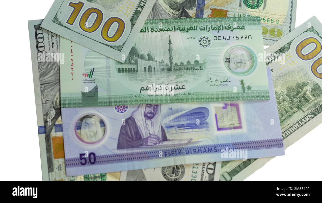 Nuove banconote in polimero degli Emirati Arabi Uniti con nuove banconote in dollari USA Foto Stock