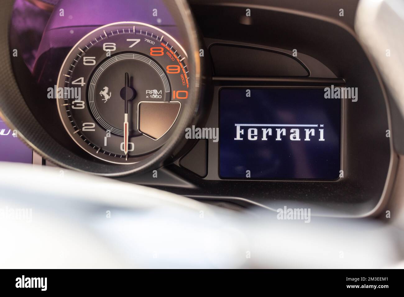 Slovenia, Lubiana - 2 giugno 2022: Red Ferrari F8 Tributo Italian Luxury sports car interior Foto Stock