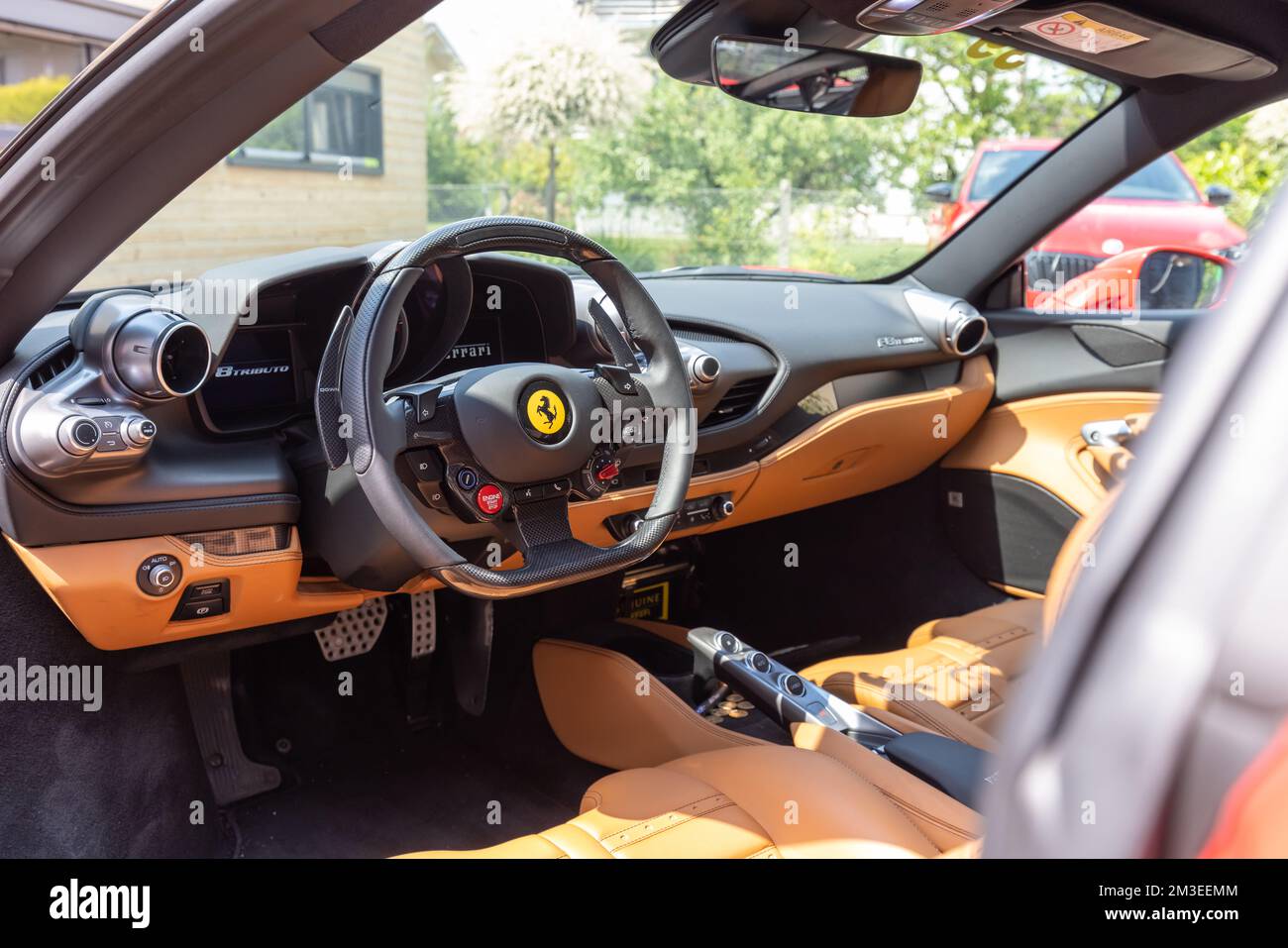 Slovenia, Lubiana - 2 giugno 2022: Red Ferrari F8 Tributo Italian Luxury sports car interior Foto Stock