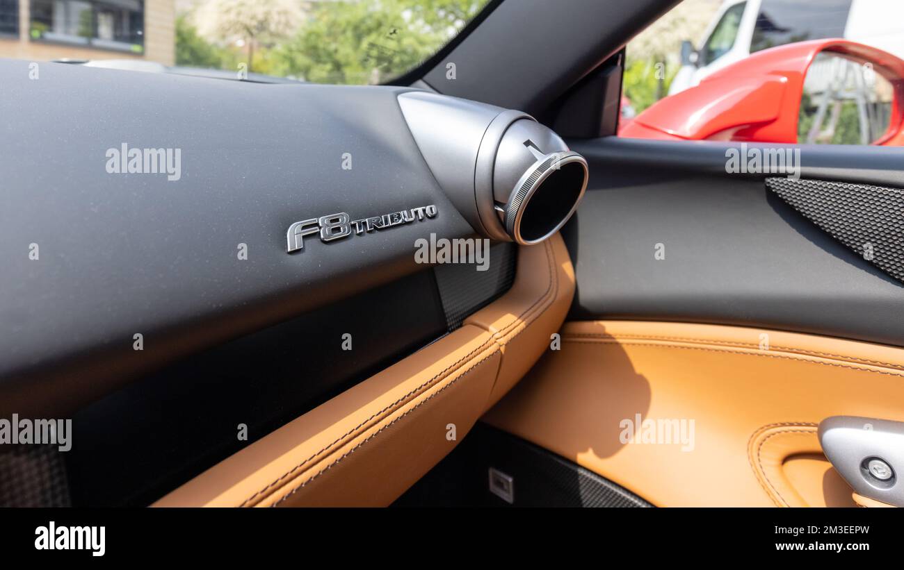 Slovenia, Lubiana - 2 giugno 2022: Red Ferrari F8 Tributo Italian Luxury sports car interior Foto Stock