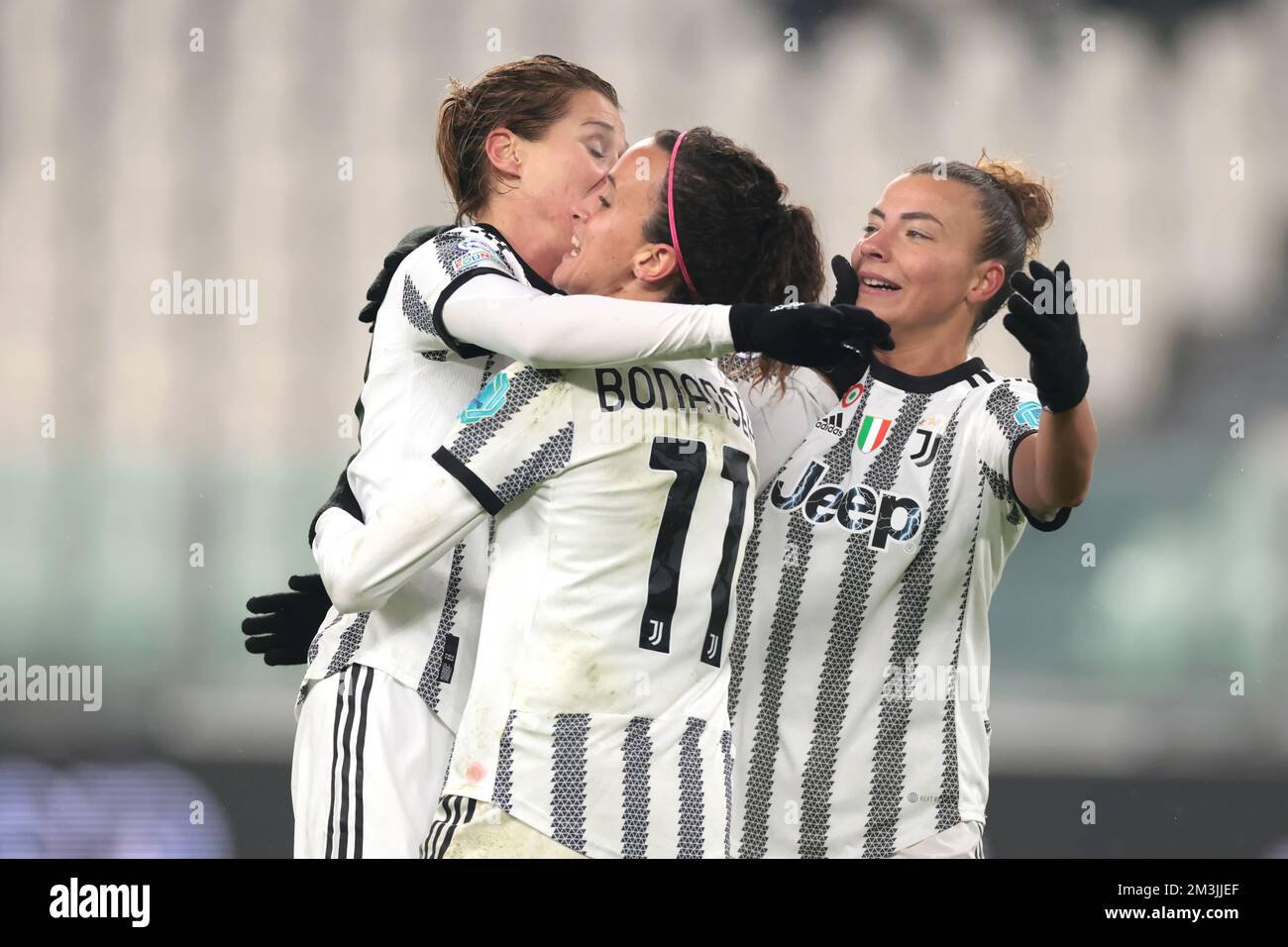 Torino, 15th dicembre 2022. Cristiana Girelli della Juventus festeggia con  i compagni di squadra Barbara Bonansea e Arianna Caruso dopo aver segnato  per completare il suo trucco e dare al lato un
