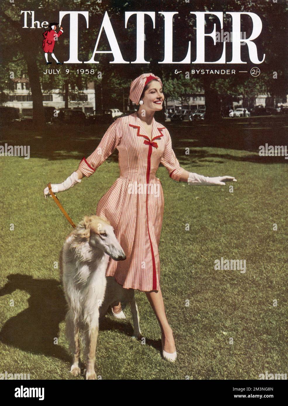 1958 Tatler Cover: Donna alla moda in un parco Foto Stock