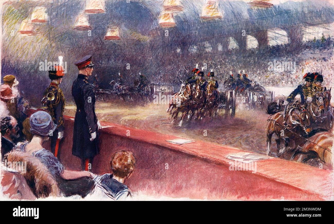 Il Torneo reale di Olympia, che mostra un'immagine impressionante di uno degli eventi più popolari del programma - il Musical Drive di M Battery della R.H.A (Royal Horse Artillery). Data: 1927 Foto Stock