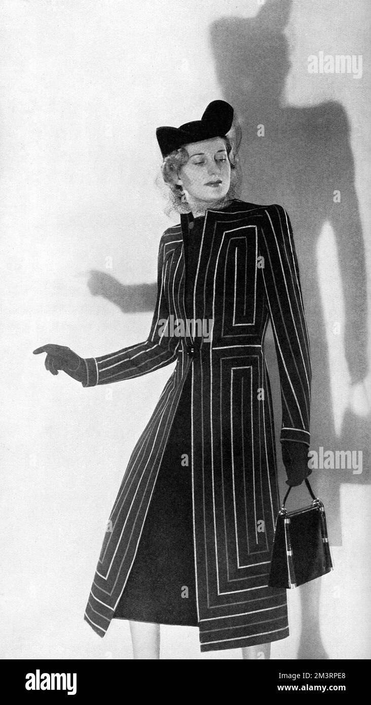 Un cappotto a righe che sottolinea la silhouette alla moda del 1939 di Jay's of Regent Street. 1939 Foto Stock