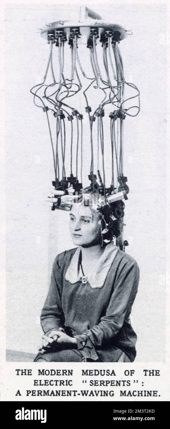 Una macchina ondulatrice elettrica permanente, medusa, 'serpenti', esposta alla Fiera annuale dei parrucchieri. Data: 1928 Foto Stock