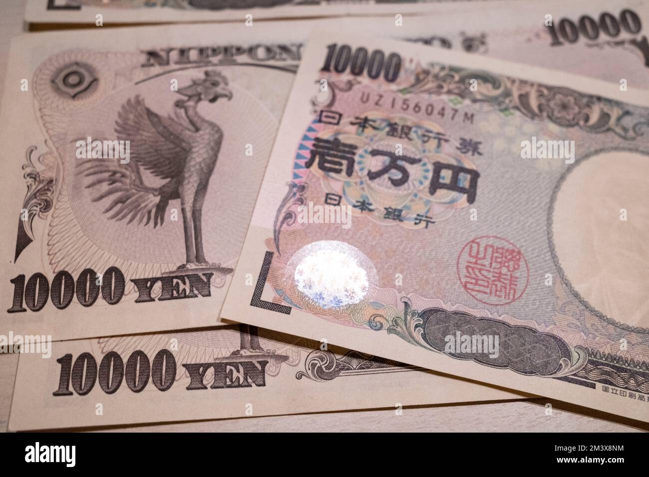 Tokyo, Giappone. 11th Dec, 2022. 10.000 banconote giapponesi Yen Â emesse dalla Banca del Giappone (Nippon Ginko) con Samurai e Meiji, educatore dell'era della riforma Fukuzawa Yukichi. Lo Yen giapponese è la terza valuta forex più scambiata al mondo e comunemente detenuta come valuta di riserva dopo il dollaro statunitense (USD $) e l'euro (EUR). Recentemente in mezzo ad un'elevata inflazione negli Stati Uniti, spingendo la Federal Reserve degli Stati Uniti ad aumentare i tassi di interesse, inviando il valore degli Stati Uniti Il dollaro alle stelle contro le valute estere ha svalutato lo Yen, causando inflazione a cascata in Giappone a causa della re del paese Foto Stock