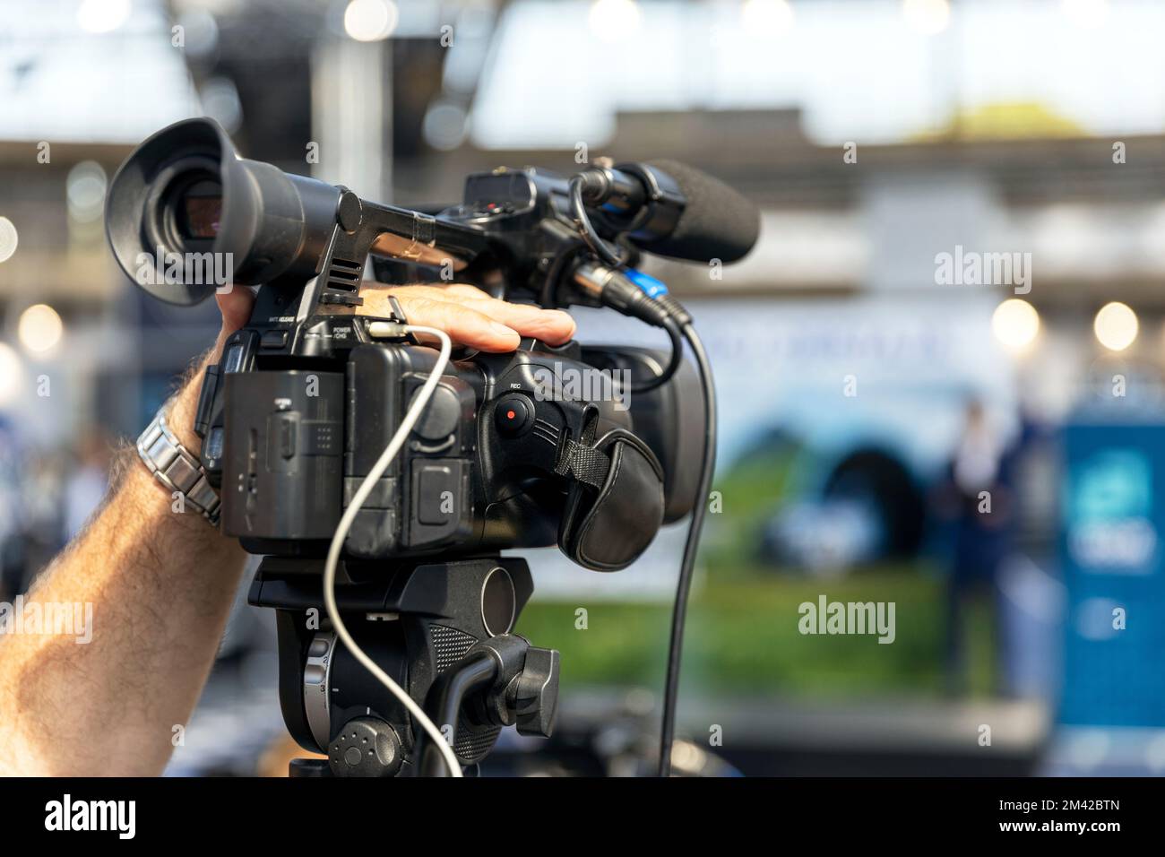 Ripresa di eventi multimediali, notizie o conferenze stampa con una telecamera Foto Stock