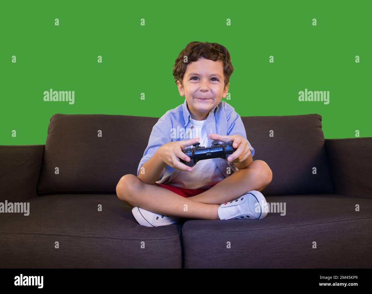 Ragazzo che gioca ai videogiochi. Foto Stock