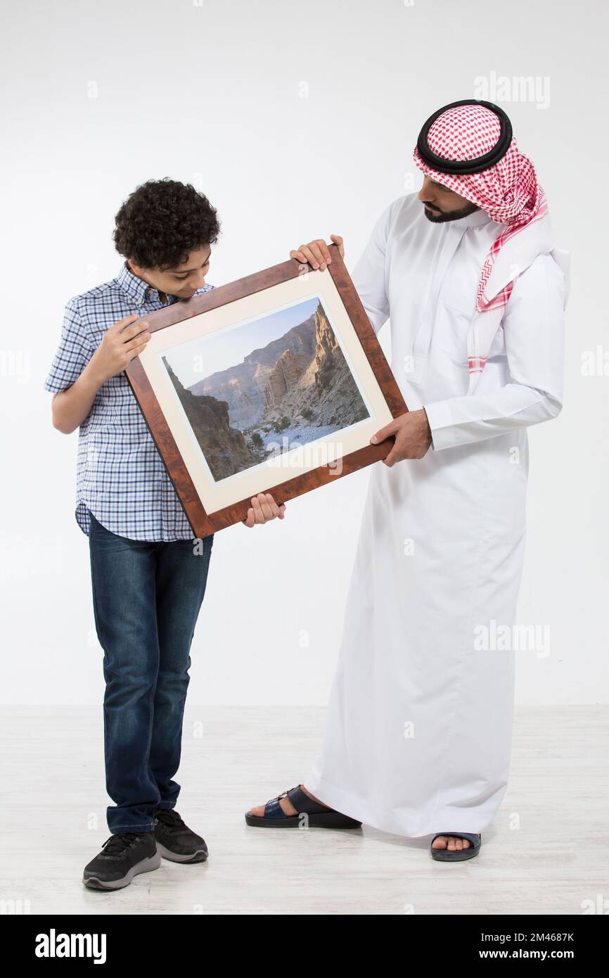 Arabo padre e figlio. Foto Stock