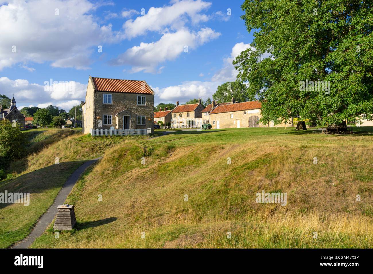 Hutton le Hole North Yorkshire Case tradizionali in pietra Hutton le Hole North Yorks Moors National Park Hutton le Hole Yorkshire Inghilterra Regno Unito GB Europa Foto Stock