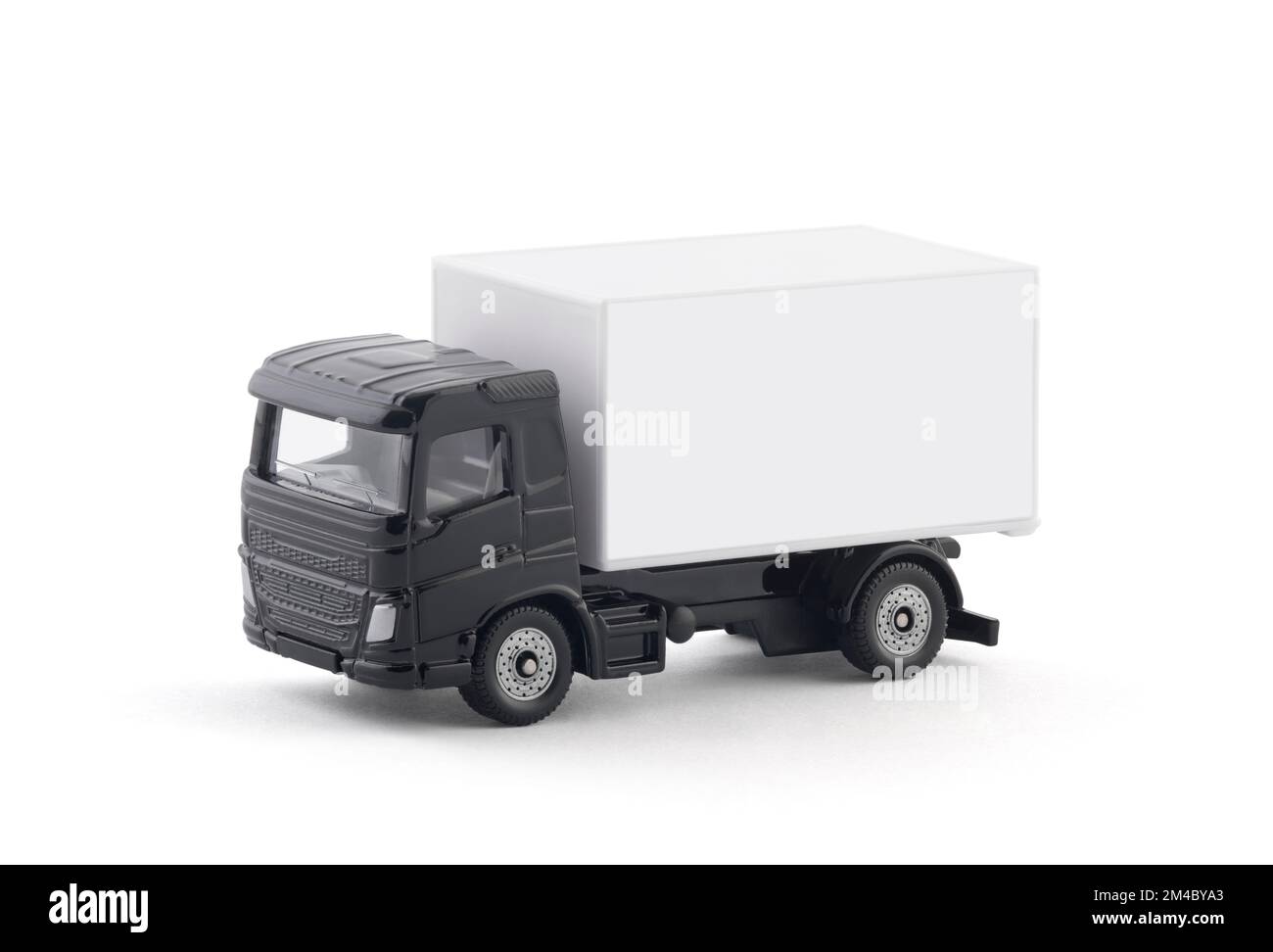 Camion di consegna del carico in miniatura isolato su sfondo bianco con percorso di aggancio Foto Stock Camion di consegna del carico in miniatura isolato su sfondo bianco con percorso di aggancio Foto Stock