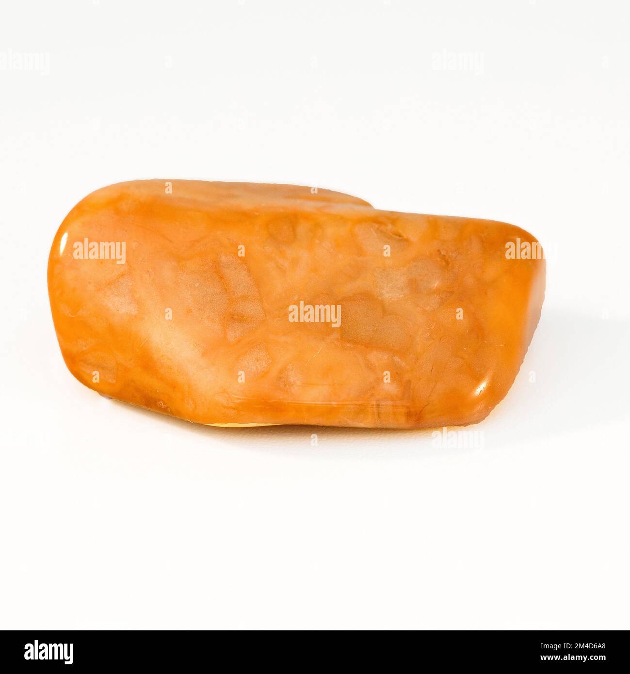 Macro scatto una fotografia a colori ravvicinata di un 'Gialle Jasper' lucido una pietra di guarigione cristallo semi-preziosa Foto Stock