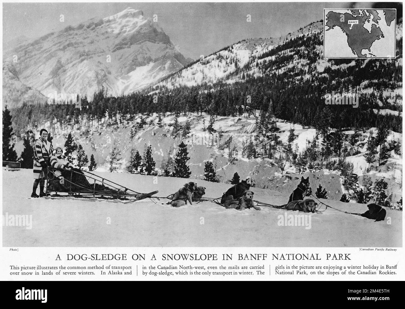 Halftone di una slitta trainata da cani nel Parco Nazionale di Banff, Canada, da una pubblicazione educativa, 1927 Foto Stock