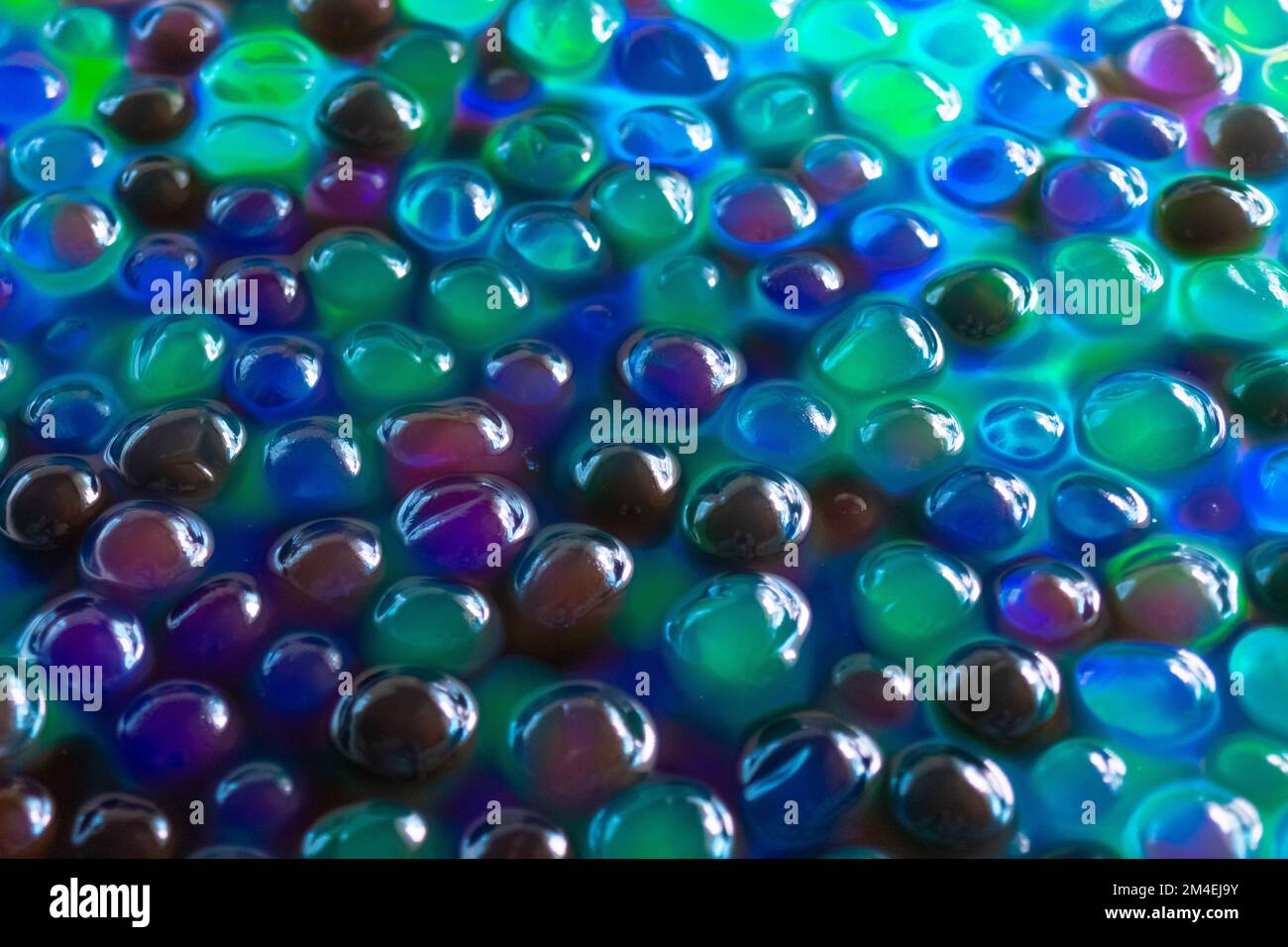 Idrogel Orbeez background.multicolore orbiz texture.Blue verde orbiz palle in acqua.idrogel palle per decorazione, giardinaggio e umidificatore d'aria Foto Stock