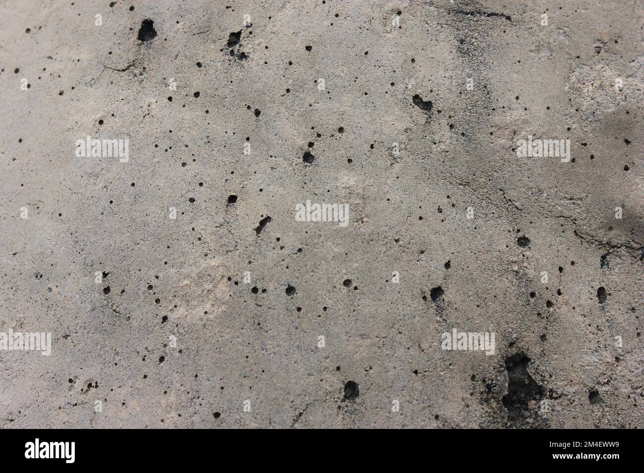 Primo piano cemento grigio poroso struttura sfondo cemento Foto Stock