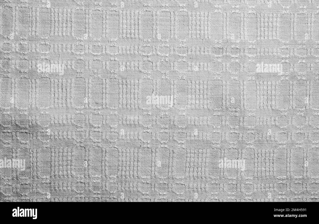 Disegno geometrico su lino. Modello per tessuti. Tessuto di lino naturale come sfondo. Foto Stock
