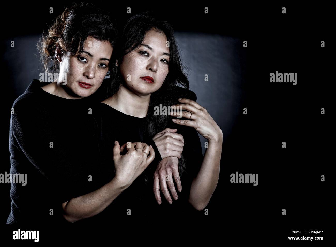 Due donne asiatiche, sorelle, fratelli coreani Foto Stock