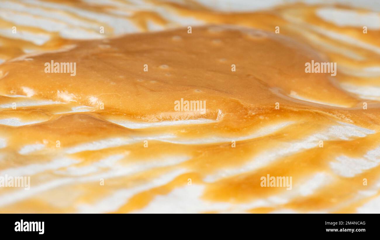 olio di hash concentrato in carta closeup. Foto Stock
