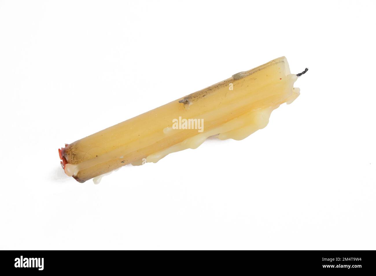 candela bianca estinta su sfondo bianco Foto Stock